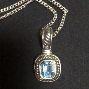 Man made blue topaz pendant